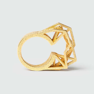 Geometric ring in gold.