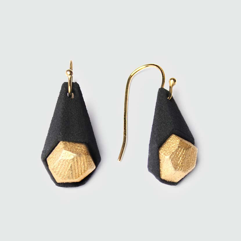 Black drop earrings with gold stones.