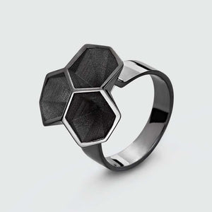 Black statement ring made of silver and black rhodium.