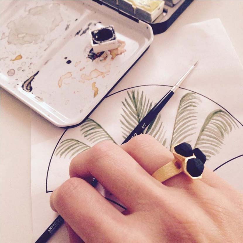 Geometric ring gold black with watercolor painting.