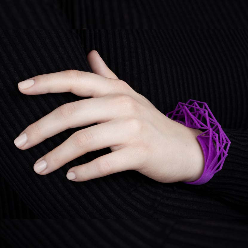 Large cuff bracelet with ultra violet color and abstract shape.