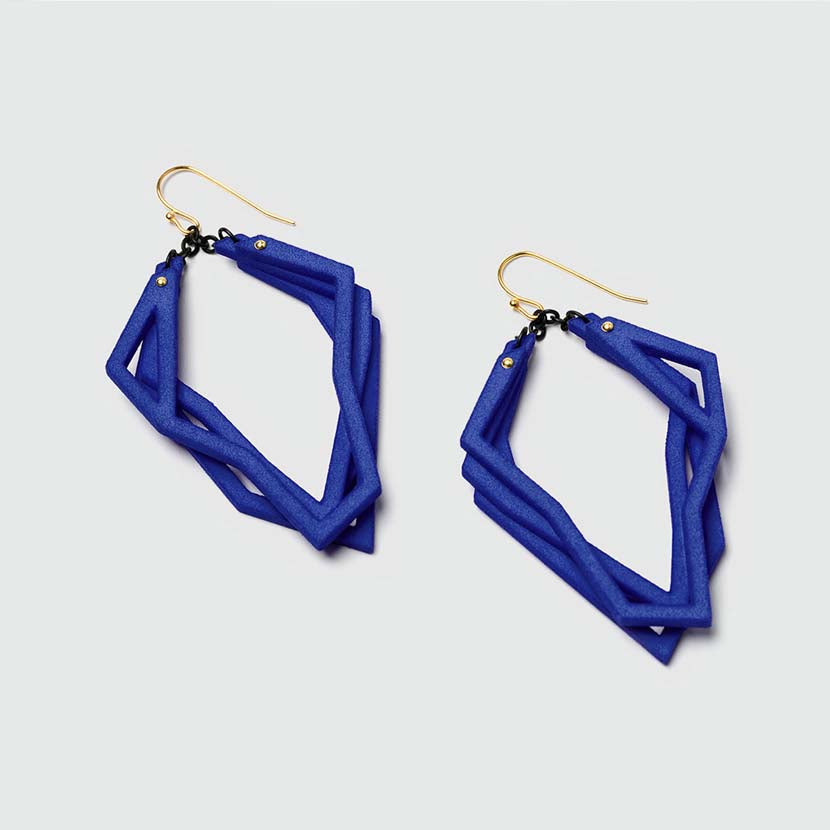 Lightweight statement earrings with royal blue color.