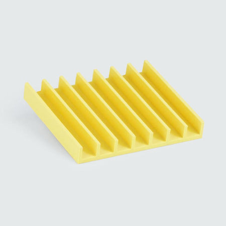 Upcycled home decor soap drain in yellow is 3D printed.